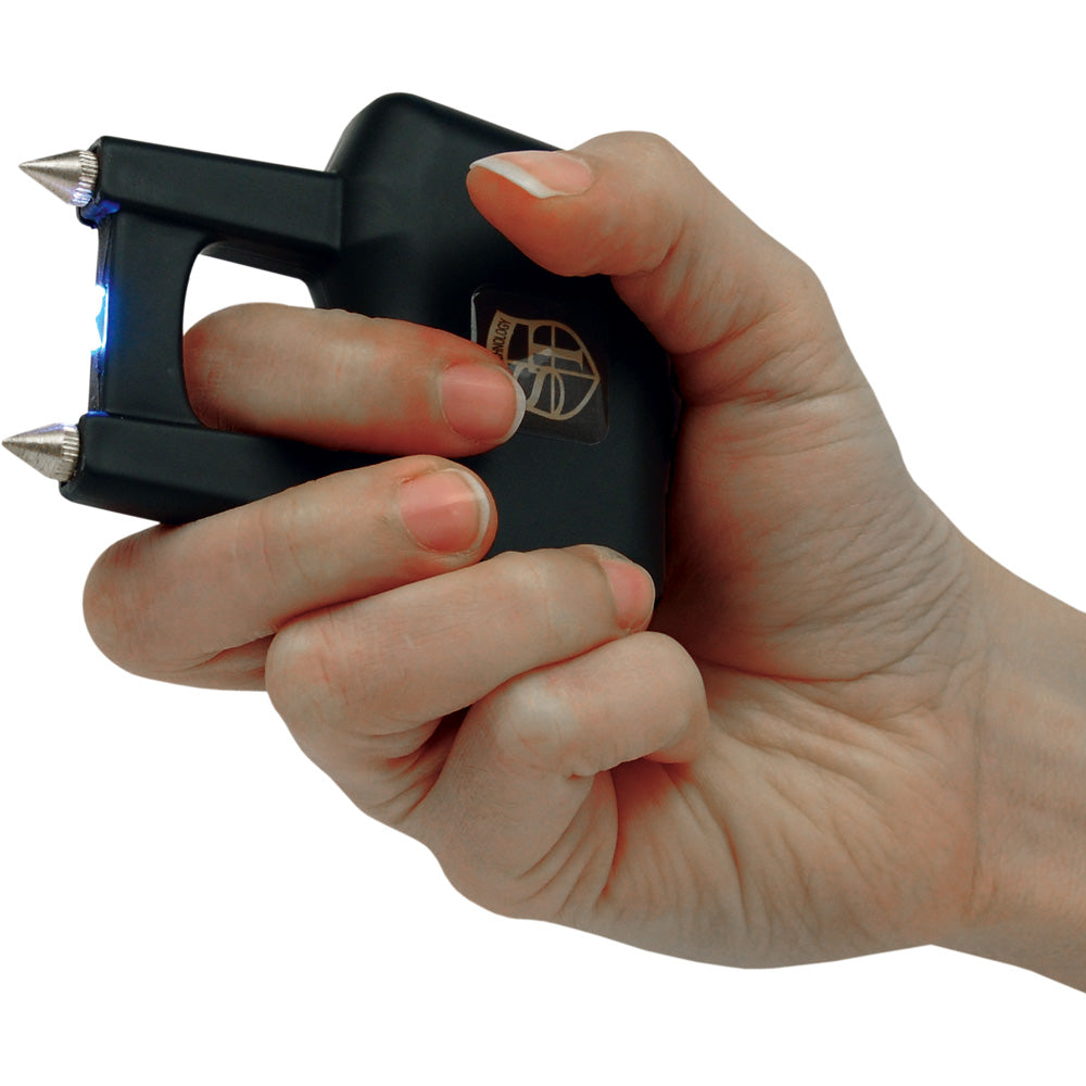 Black Safety Technology Spike Stun Gun with pointed metal spikes and compact design for personal safety.